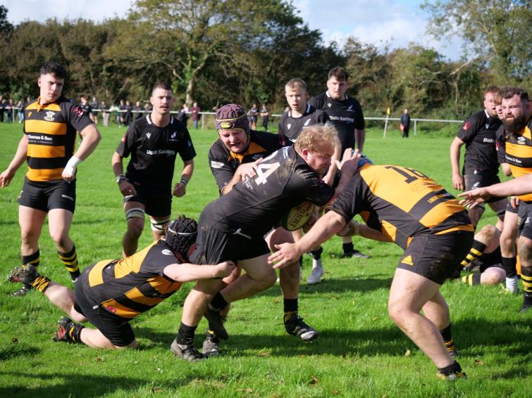 The All Blacks on a typical charge. Picture William John