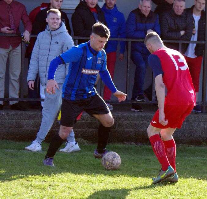 Ashley Bevan in control for Hakin United against Monkton Swifts