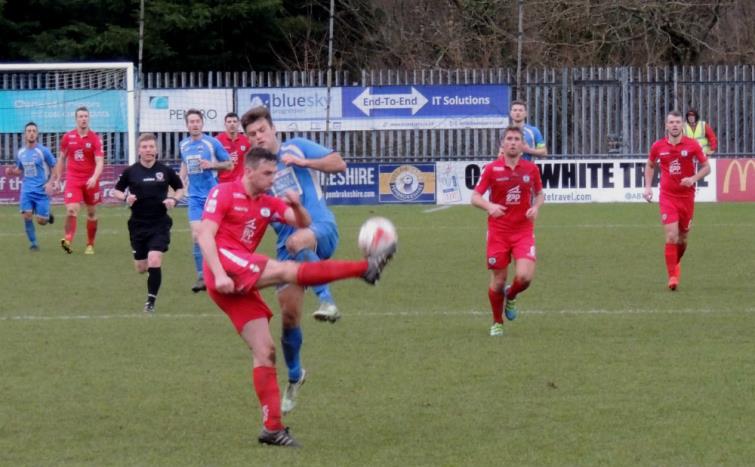 Ashley Bevan battles hard