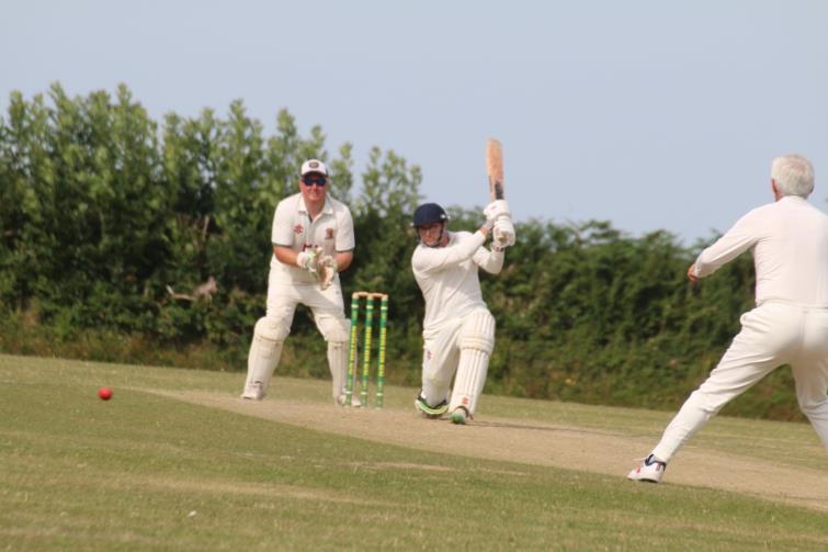 Man of the Match Ashley Sutton drives