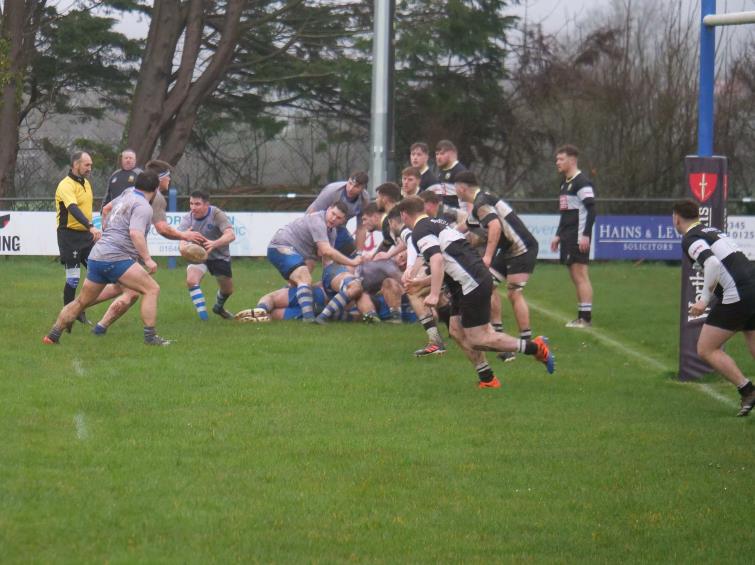  Lee Summons gets the ball away