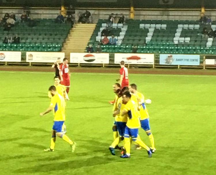 Barry players celebrate scoring at Jennar Park
