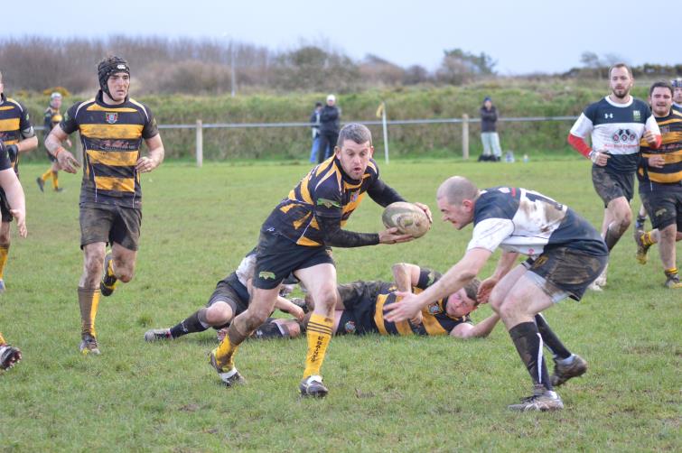 Bryan Phillips looks to pass for St Davids