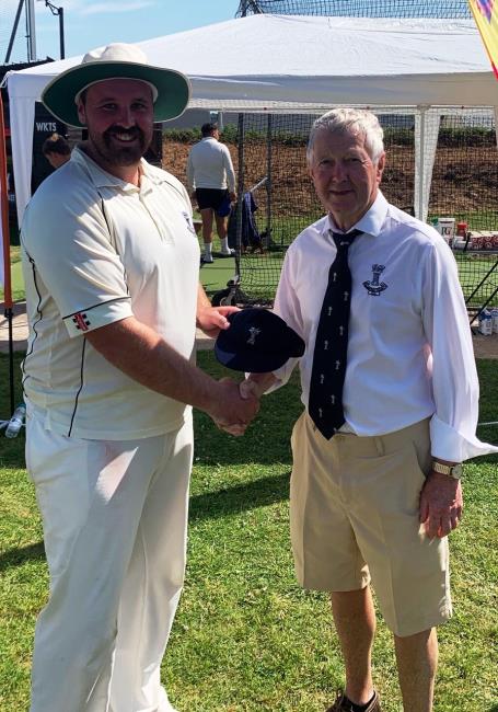 Brad McDermott-Jenkins receives his county cap from president Nick Evans