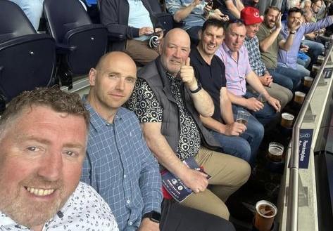 Brian Isaac enjoys the company of good friends