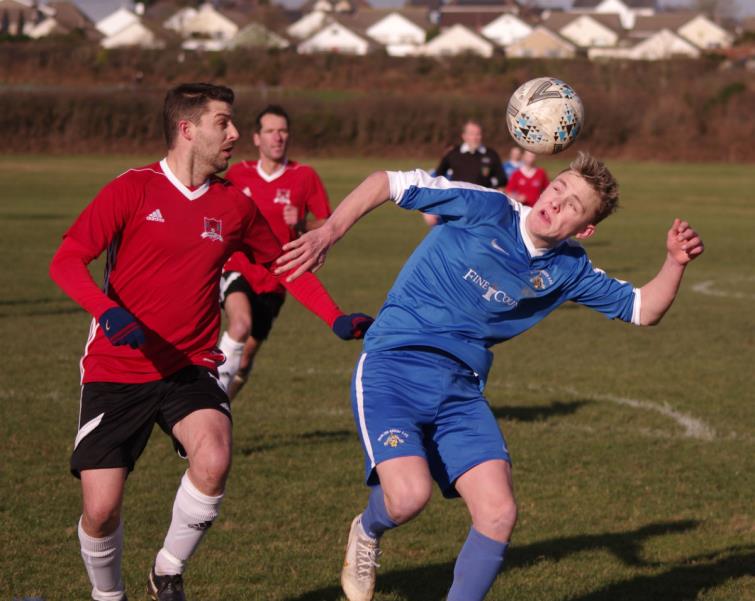 Will Haworth uses his head in Merlins Bridge’s cup win against Llandarcy