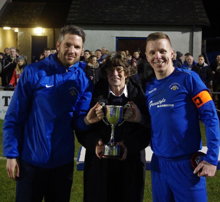 Bridges James Skudder (left) and Bradley Davies (right) receives the silverware from Rowena Lloyd Match officials