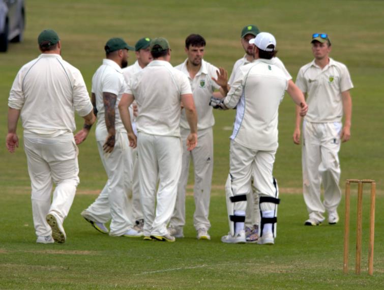Burton - enjoy their 10 wicket success on The Racecourse