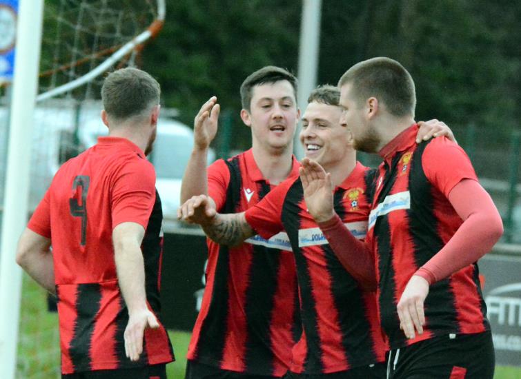 Goodwick United players celebrate sweet success. Picture Gordon Thomas
