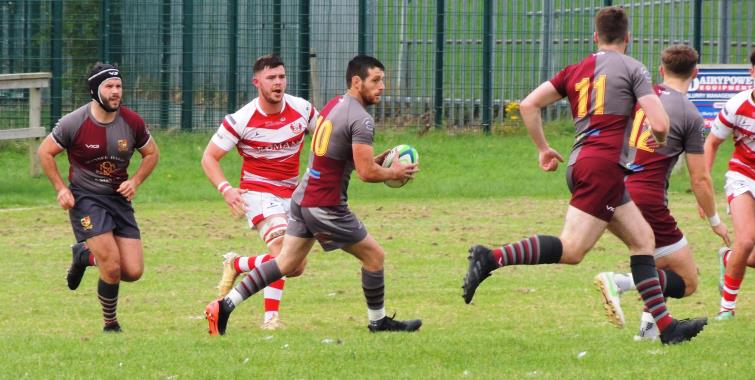 Gavin Thomas gets the Crymych back line moving