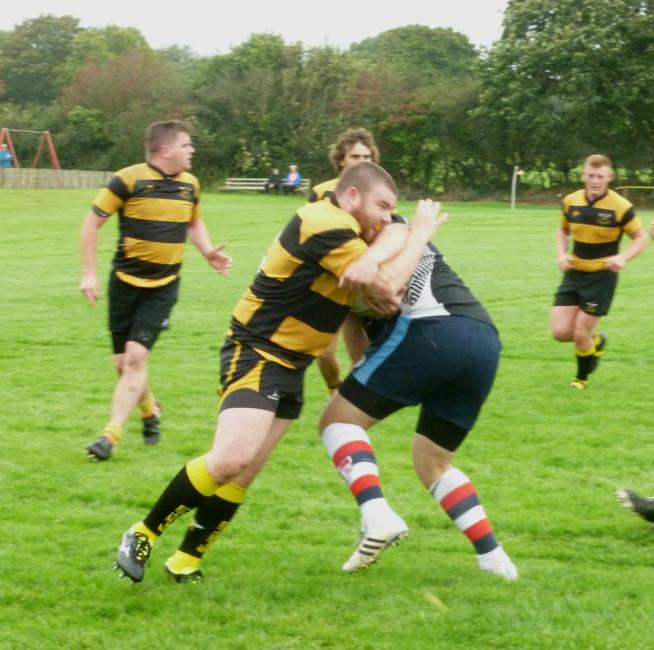 Gethin Thomas on a charge for Llangwm