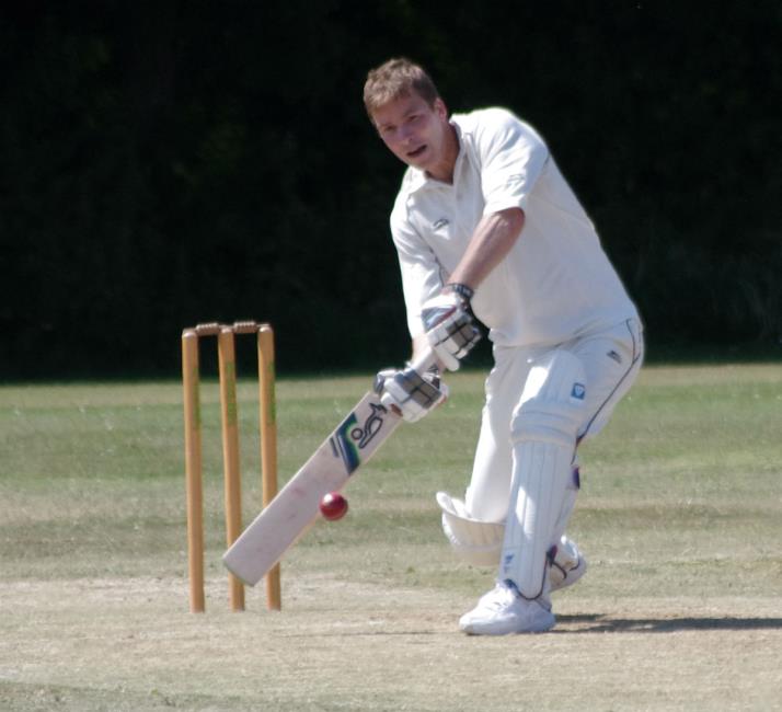 Gino Cleal smashes a shot to the boundary for Johnston