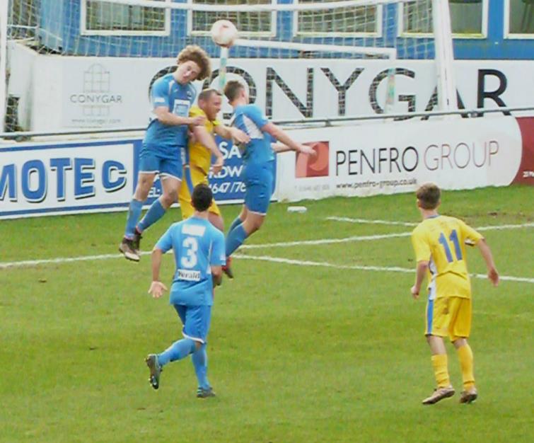 Greg Walters wins this aerial duel