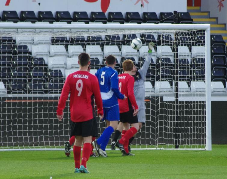 James Gwilt pulls off a cracking save to deny Morriston Olympic