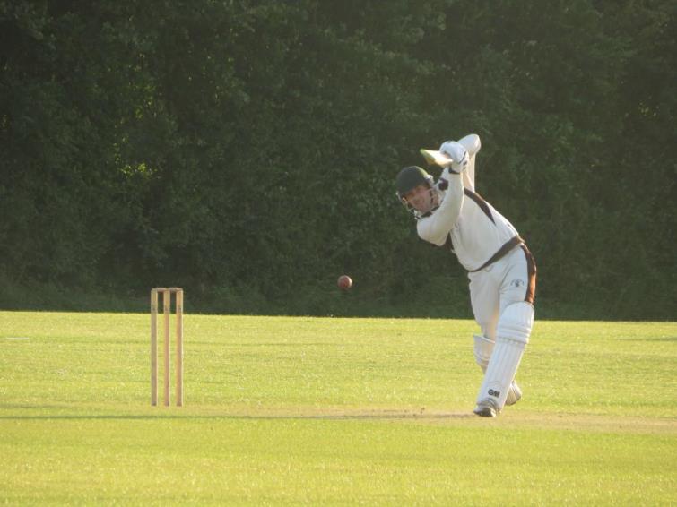Patrick Bellerby drives a boundary for Neyland