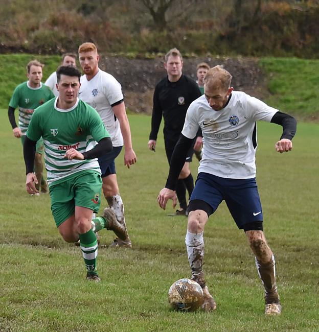 Karl Hedley pushes forward for Fishguard Sports. Picture by Johnny Morris