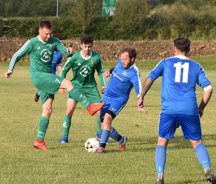 Lee Hudgell puts in a strong tackle for Wizards
