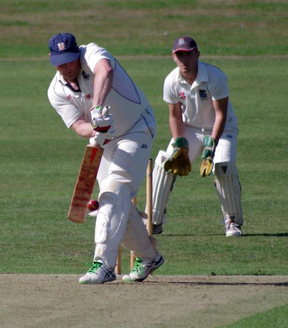 Simon Holliday clips a shot down leg for Haverfordwest