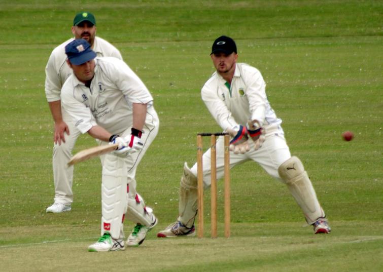 Simon Doc Holliday clips a legside boundary for The Town