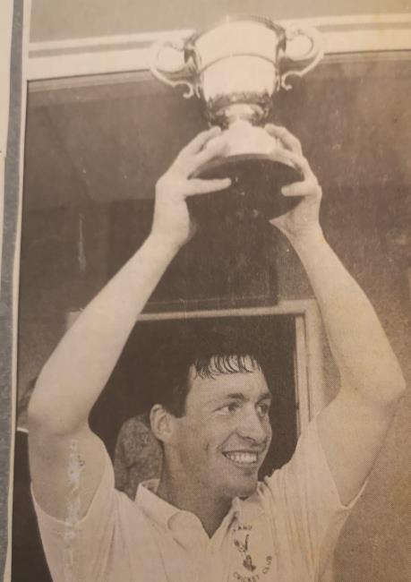Dai Lee raises the Alec Colley Cup aloft as Whitland 2nds  skipper