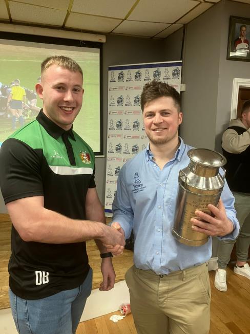 Dan Bennett presents the Dairy Crest churn to Will Pop Davies