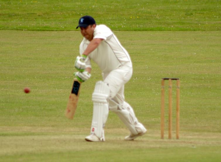 Danny Potter plays a forward defensive shot