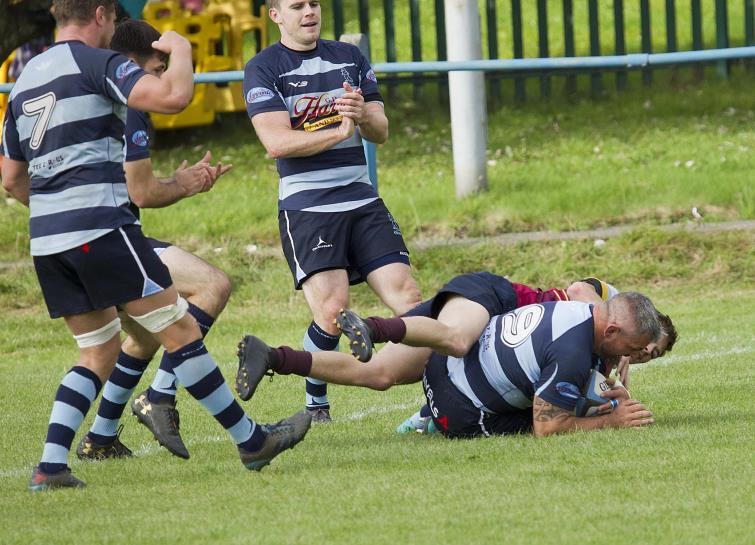 Dan scoring a try
