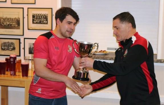 Pembroke skipper Dan James receives the trophy from Darrell Willington. All pictures by Daf Palmer