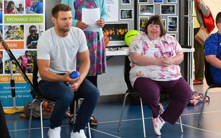 Rugby star Dan Bigger takes part in a game of bowls