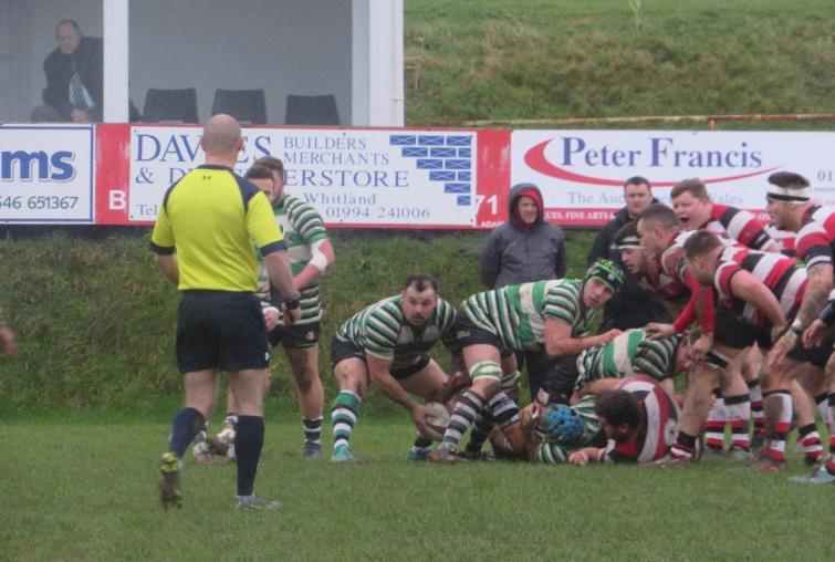 Marc Jones looks to move the ball for Whitland