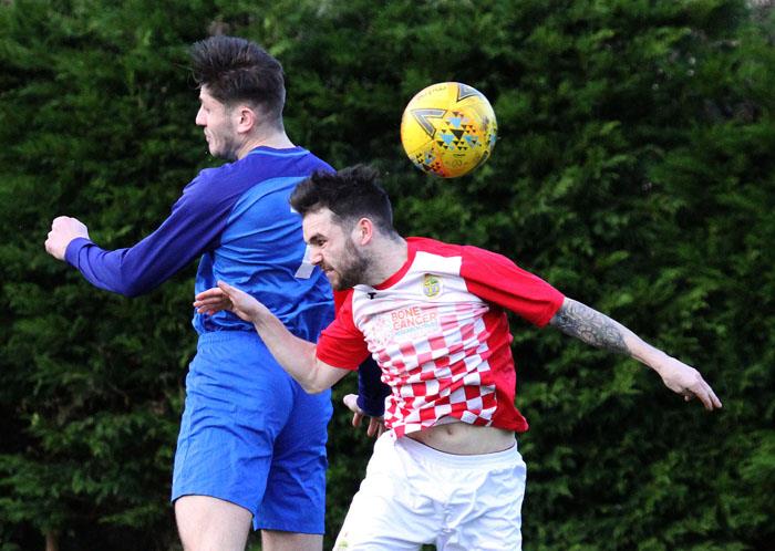 Fraser Finlay and Chris Millward   challenge for the ball. Picture by Susan McKehon