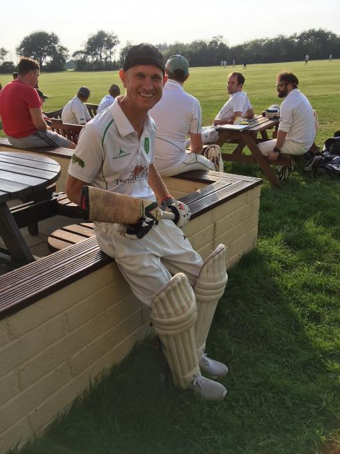 Fraser Watson with bat in hand