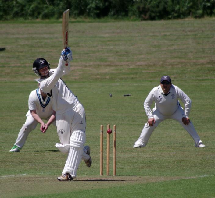 Neylands Nick Koomen is bowled by The Towns Adam James