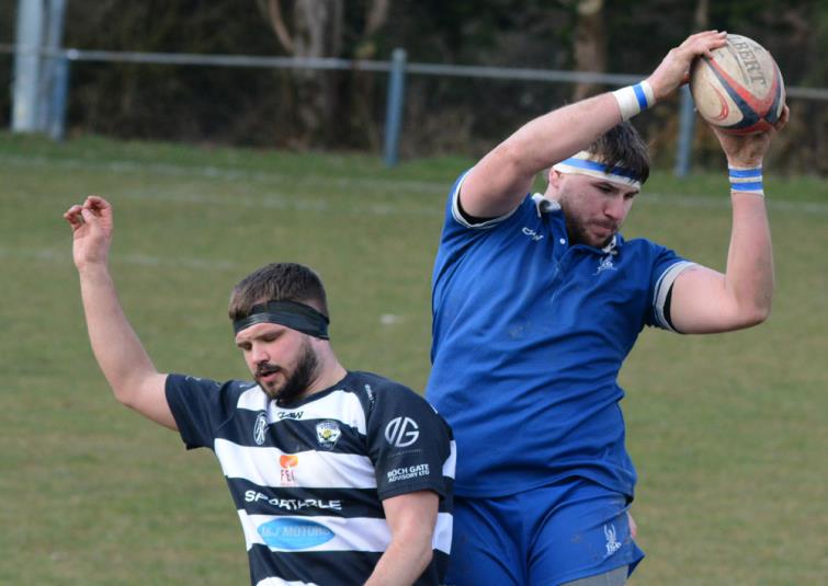 Skipper Karl Busch takes clean lineout ball for The Blues against Tumble. Picture Gordon Thomas