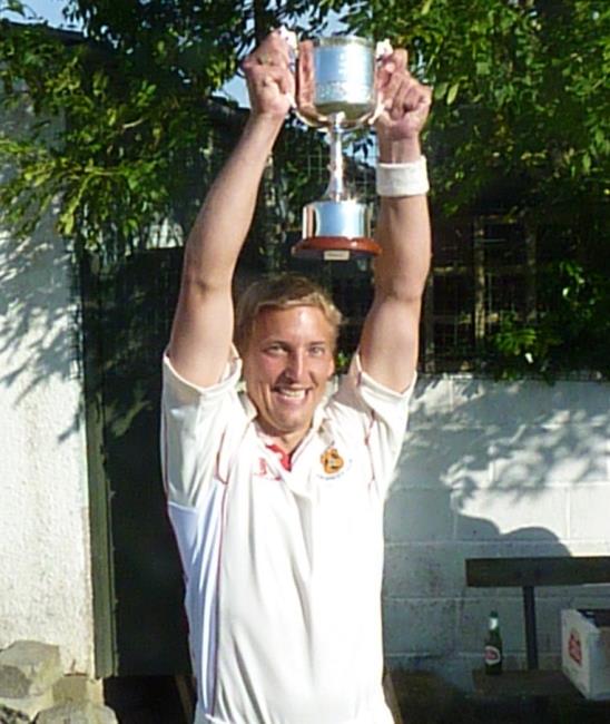 Haydn Shapcott raises the Ken Morris Cup for Carew