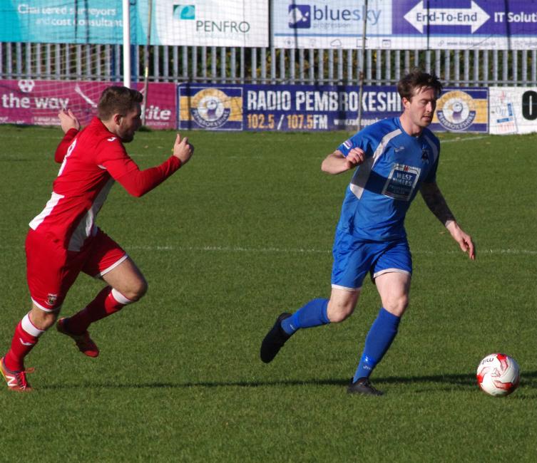 Kieran O Brien presses forward