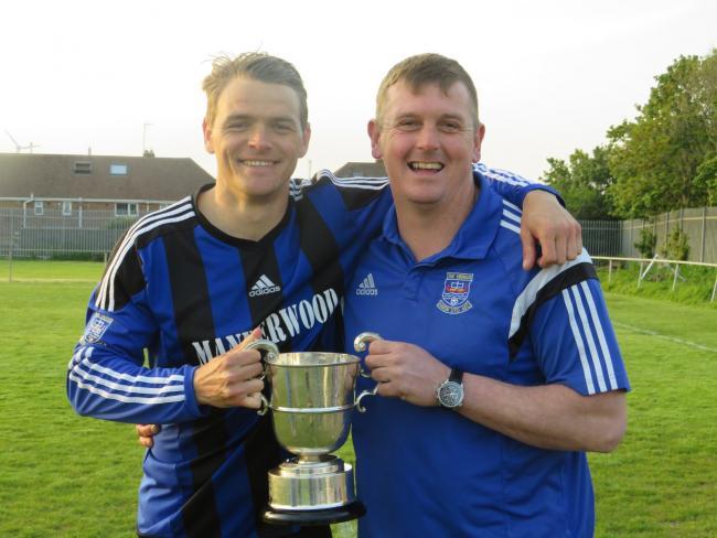 Nicky Woodrow and Kristan Bennett with the Division One silverware