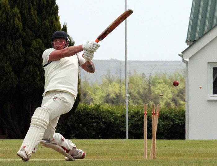 Kyle Quartermaine (44) is bowled by Tom Arthur. Picture by Susan McKehon