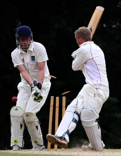 Haydn Shapcott loses his wicket to the bowling of Jonathan Thomas