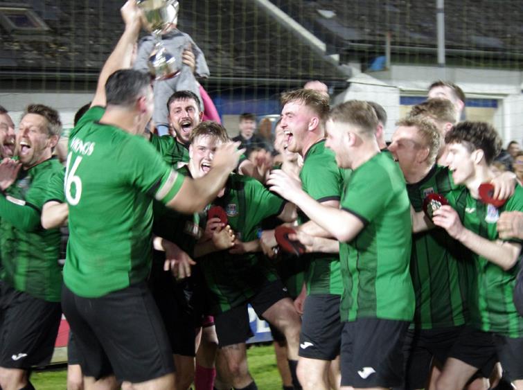 Hakin United 2nds celebrate winning the cup