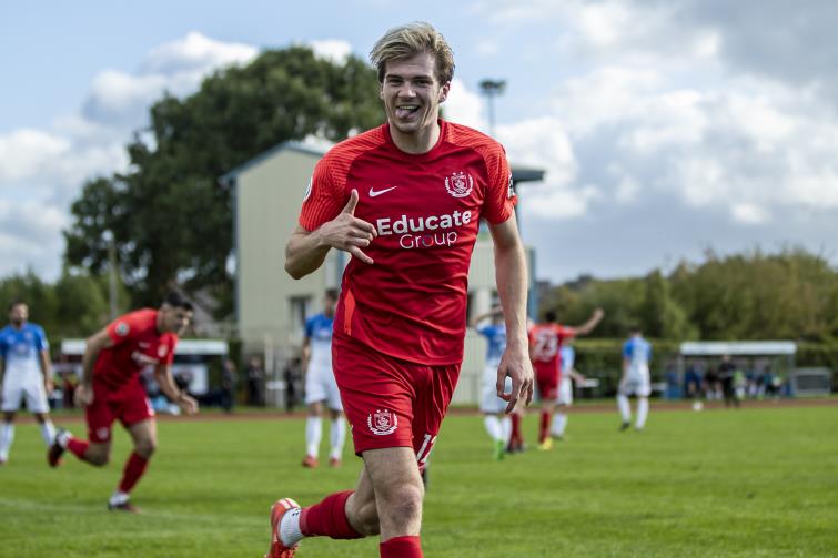 Harry Franklin celebrates scoring the winner for The Nomads