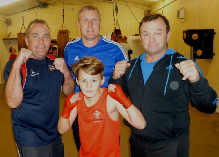 Harry Laverick with bocing coaches at Merlins Bridge