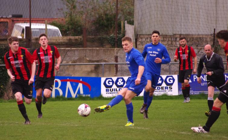 Wizards midfielder Dai Davies passes in search of a goal at Phoenix Park