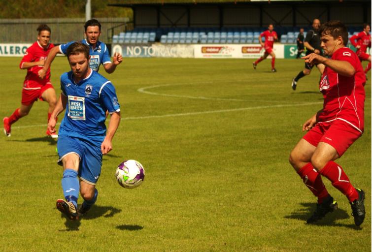 Steffan Williams plays the ball down the line