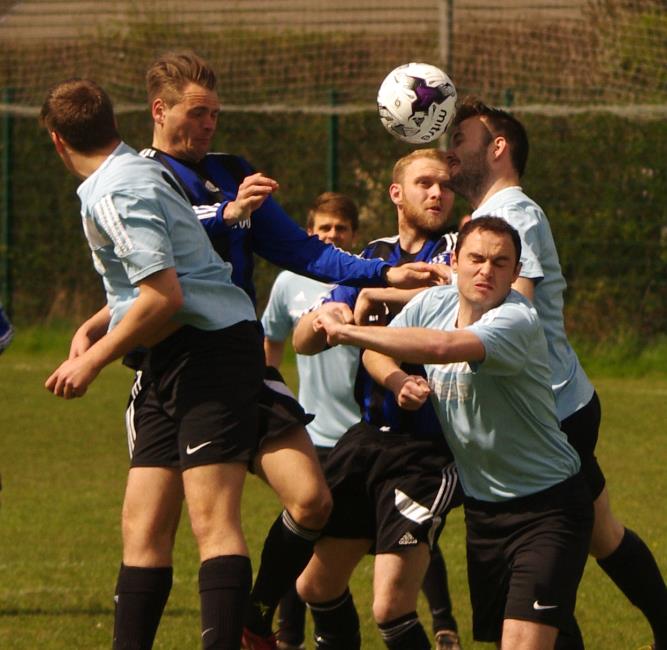Nicky Woodrow and Patrick Bellerby go head to head at the Athletic Ground