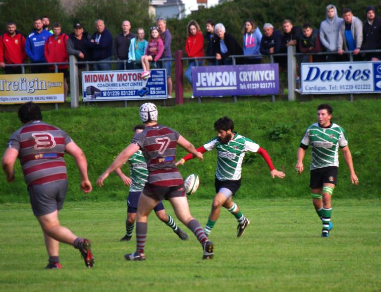 Whitland outside half Nico Setaro kicks for territory