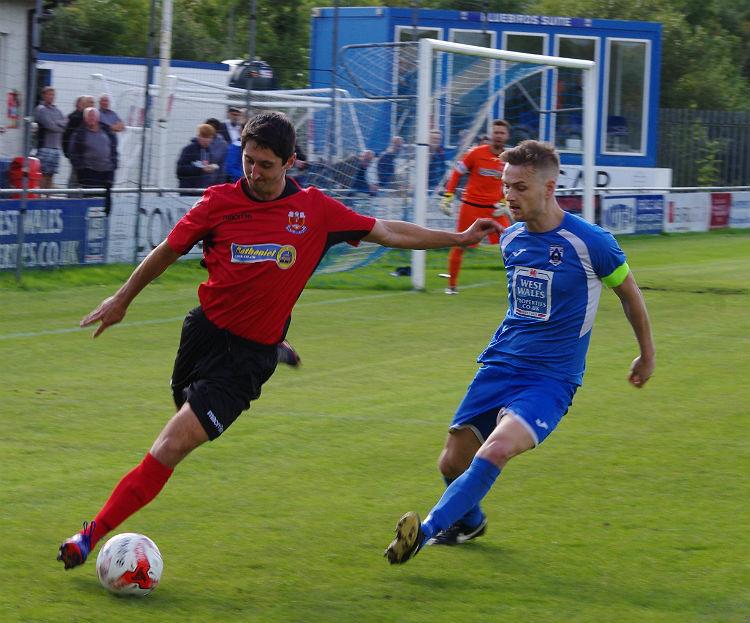 Sean Pemberton closes in to make a tackle