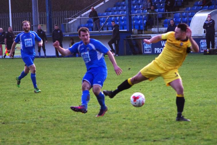 Steffan Davies has a shot at goal