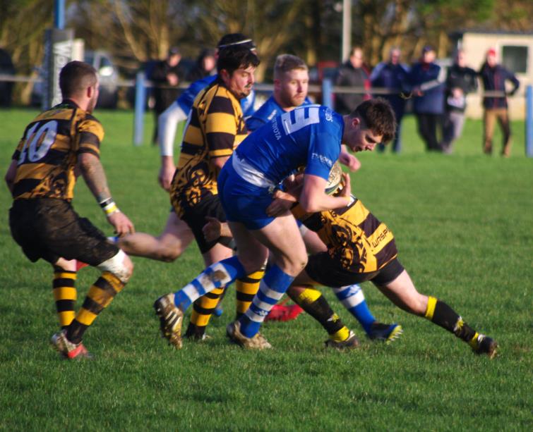 Liam Manwaring is tackled