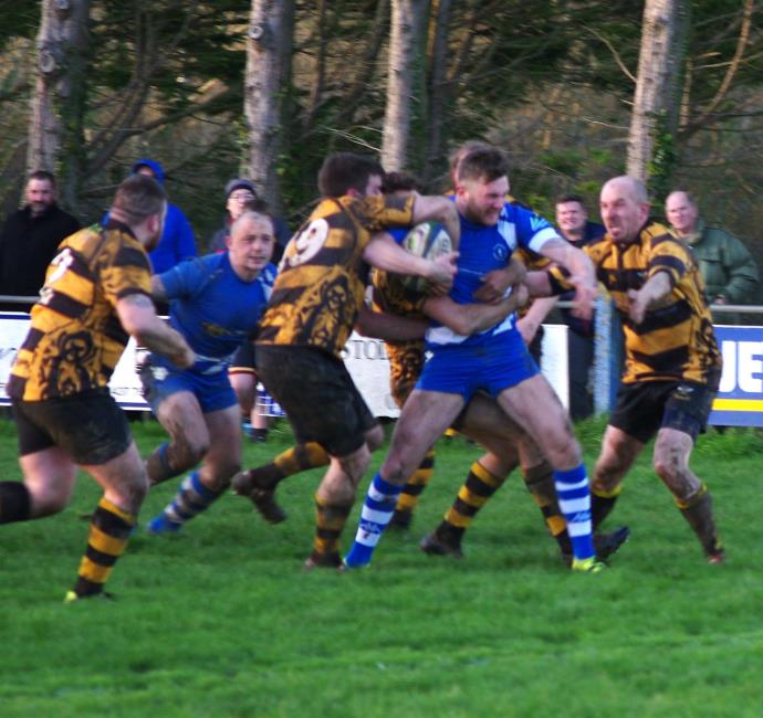 Replacement centre Ben Skudder runs hard
